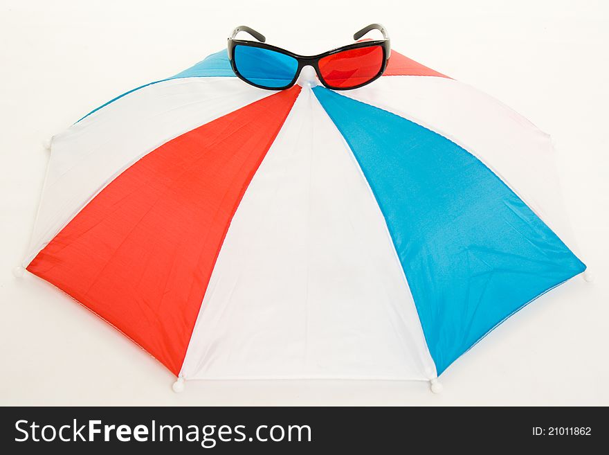 Glasses and an umbrella on a white background.