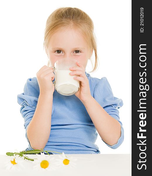 Girl drinking milk on a white background.