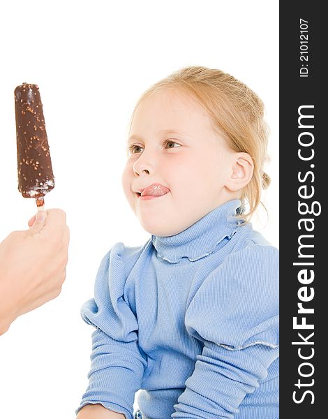 Girl eating ice cream on a white background.