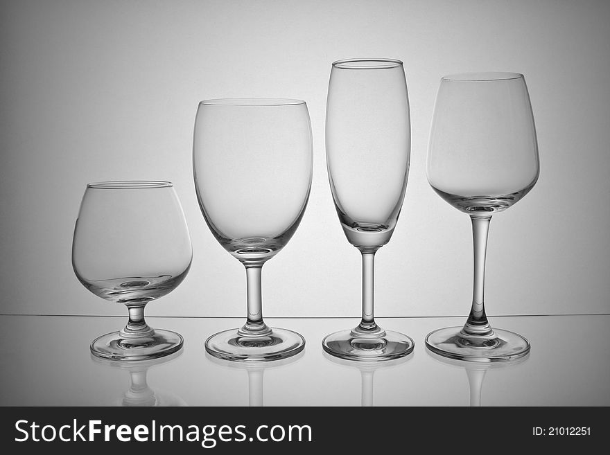Empty wine glass on gray background