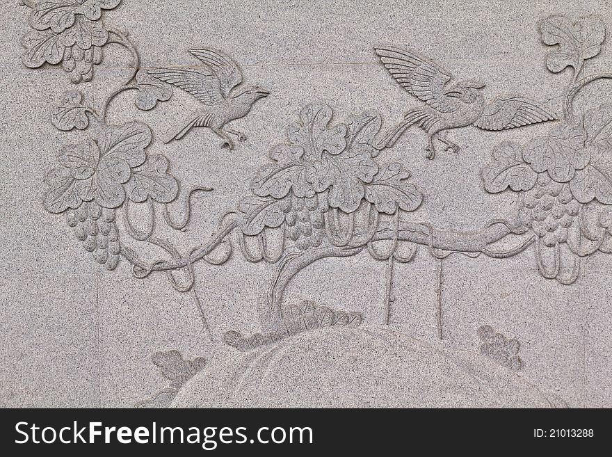 Bird Carved On Stone Wall In Chinese Temple