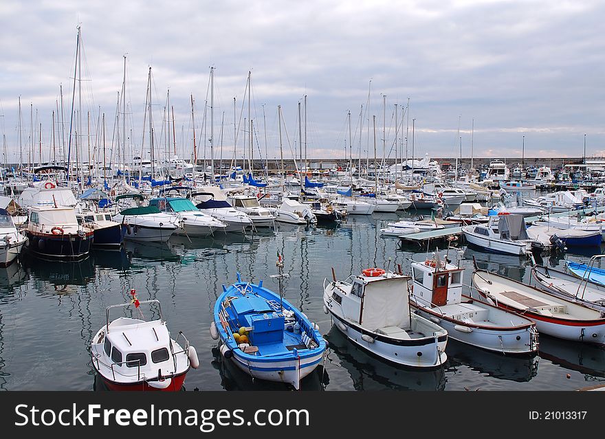 Different kinds of boats in the parking of the port of San Remo. Different kinds of boats in the parking of the port of San Remo