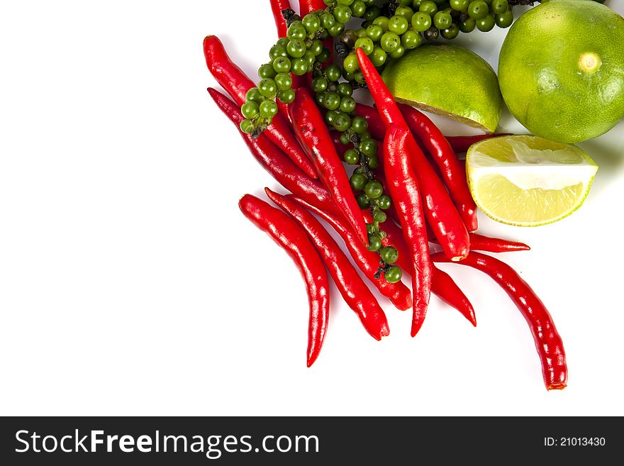 Mix food ingredient chili peppercone and lime on the white background with blank text message copy space. Mix food ingredient chili peppercone and lime on the white background with blank text message copy space