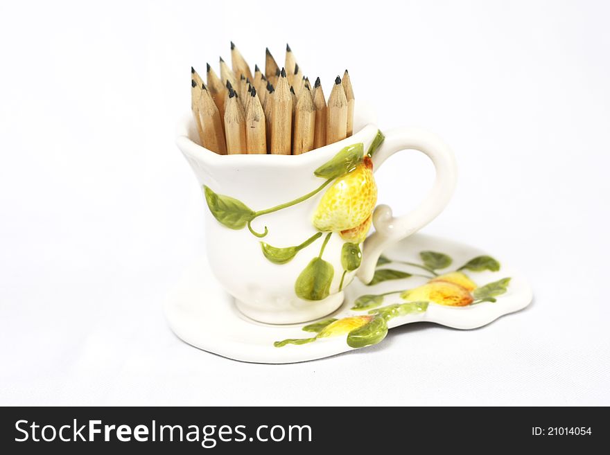 A group black pencil in a cup