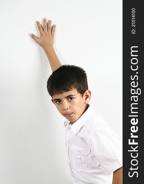 Portrait of happy little boy over white background. Portrait of happy little boy over white background