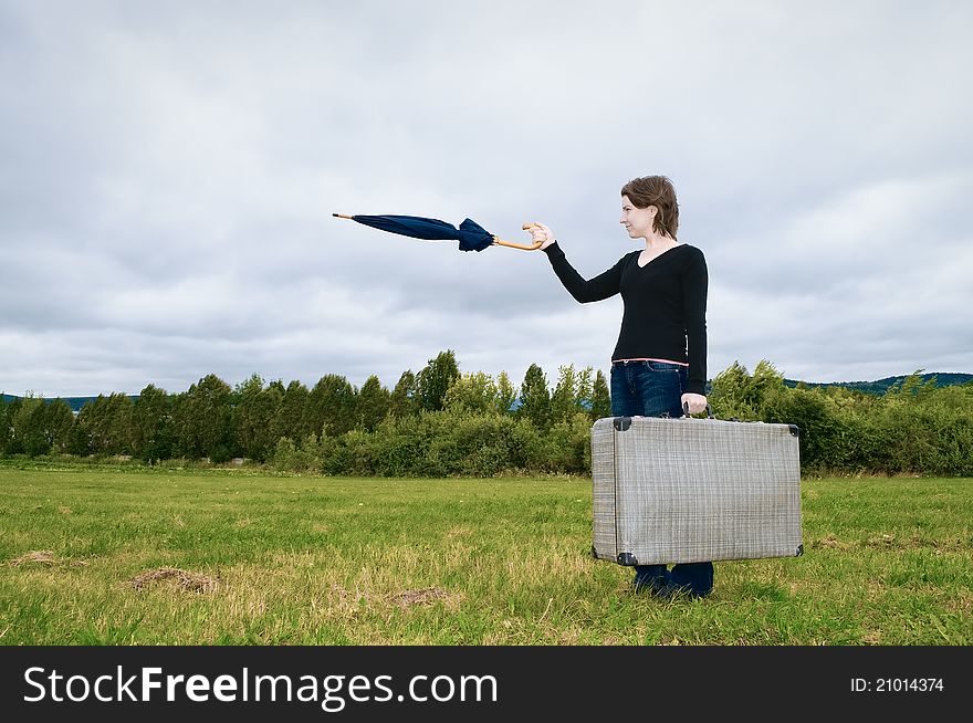 Woman pointing on the meadow