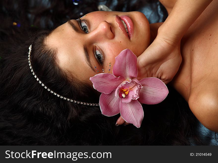 Orchid woman flower in hairs
