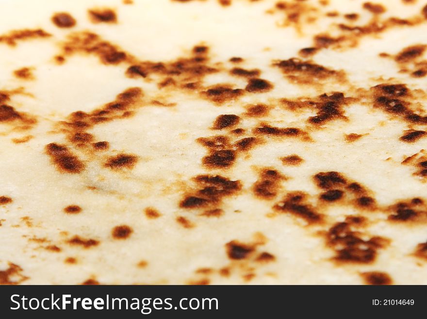 Closeup with toasted pancake background