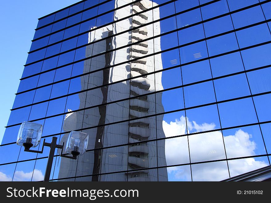 Office  building and reflection in its windows