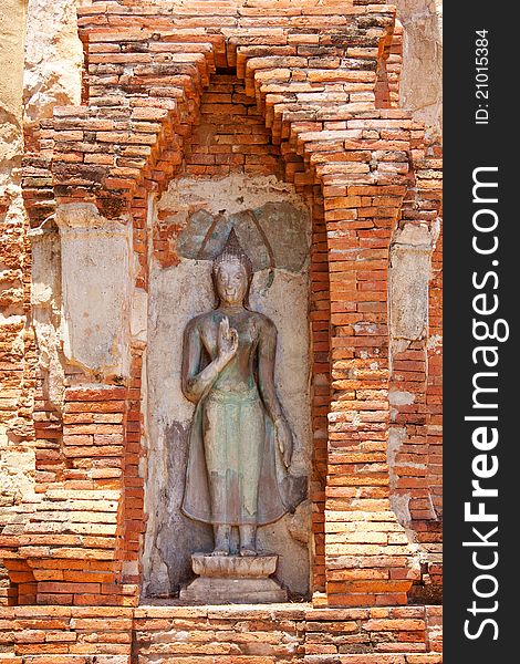 Buddha Carving on wall in Thailand