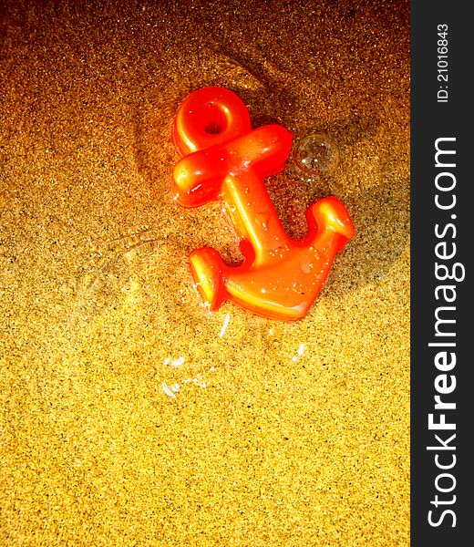 Anchor on the sand of the sea at sunset. Anchor on the sand of the sea at sunset