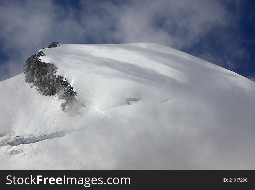 The detail of Allalinhorn mountain in Pennine Alps, Switzerland. The detail of Allalinhorn mountain in Pennine Alps, Switzerland.