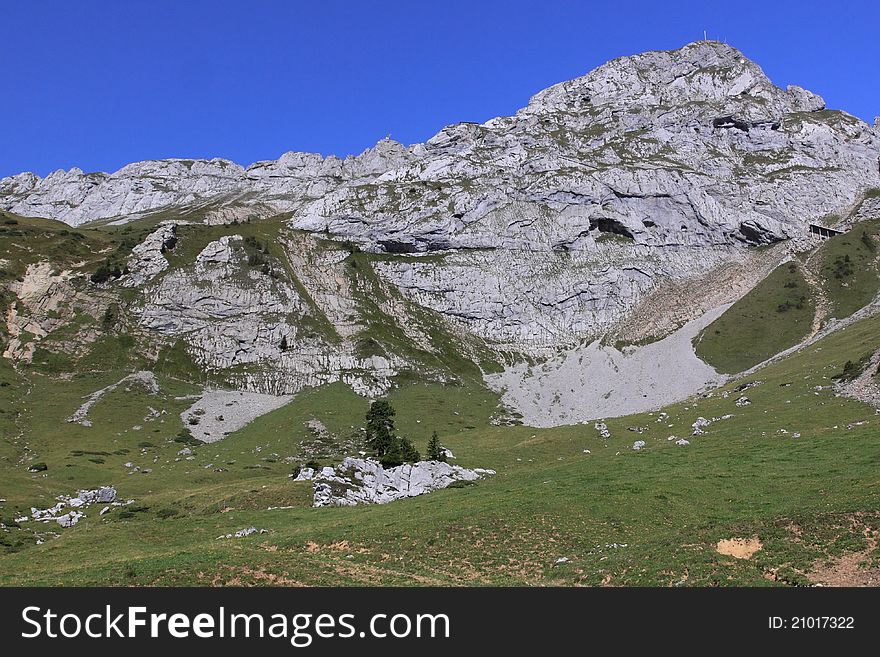 The view of mountain Pilatus from the train climbing up to the top of it on cogwheel railway.