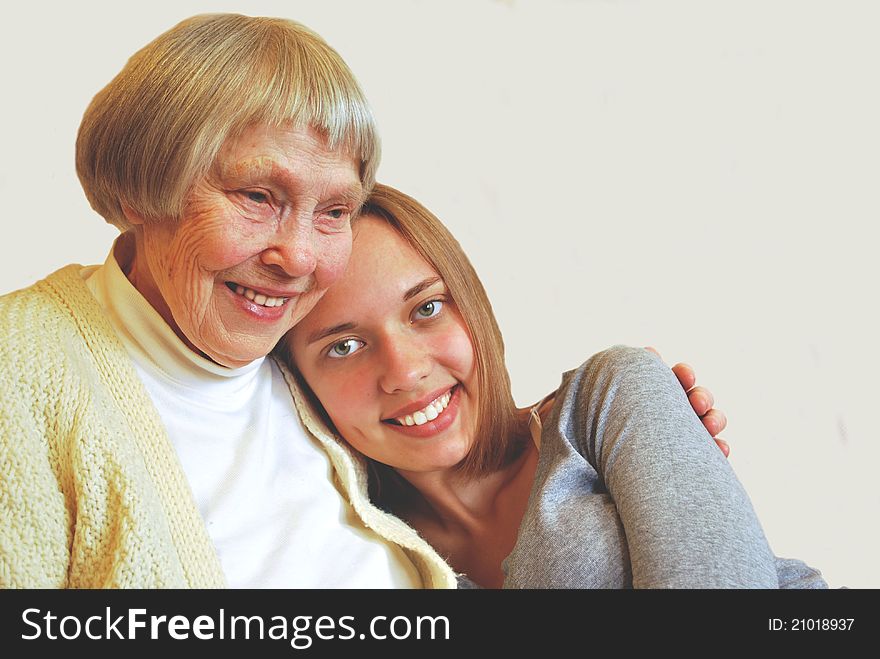 Young women embraced with her grandmother. Young women embraced with her grandmother