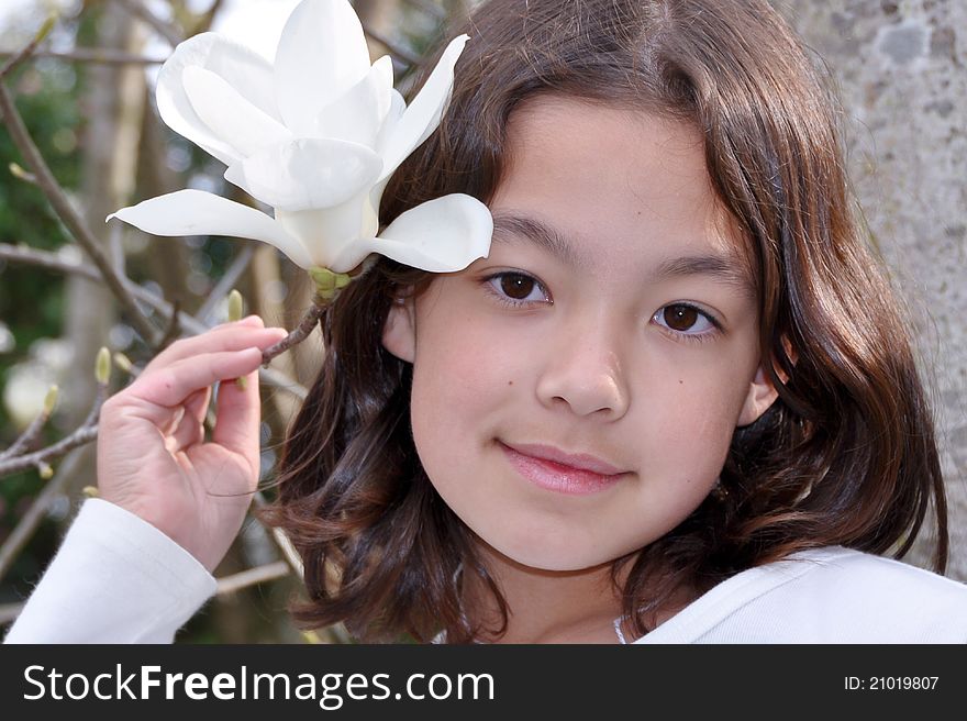 Japanese girl with flower magnolii. Japanese girl with flower magnolii