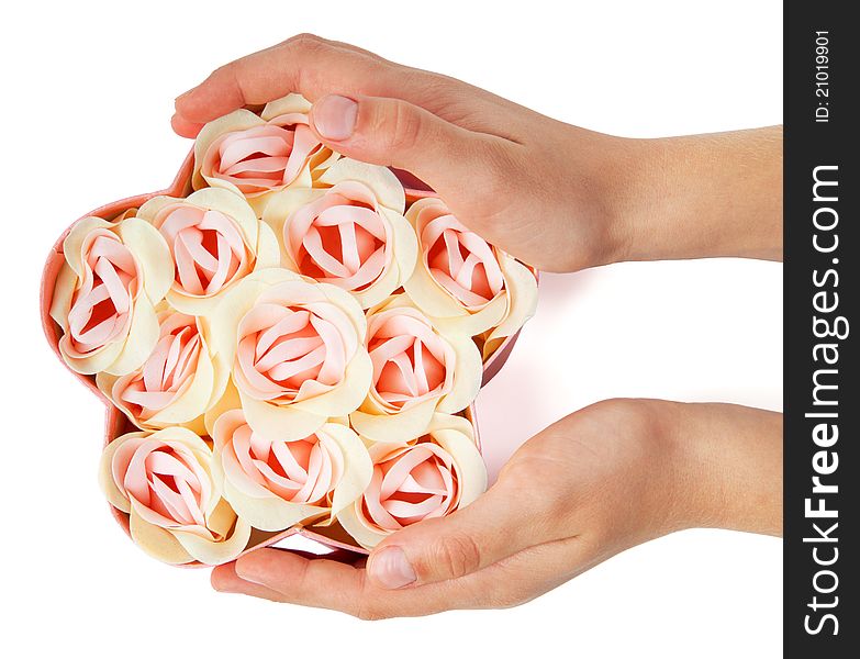 Flower shaped box with flowers in girl hands