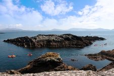 Kayaks Among Rocky Islands Stock Photos Kayaks Among Rocky Islands Stock Photos