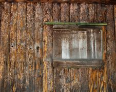 Window Of A Boarded Up Log Cabin Stock Photo