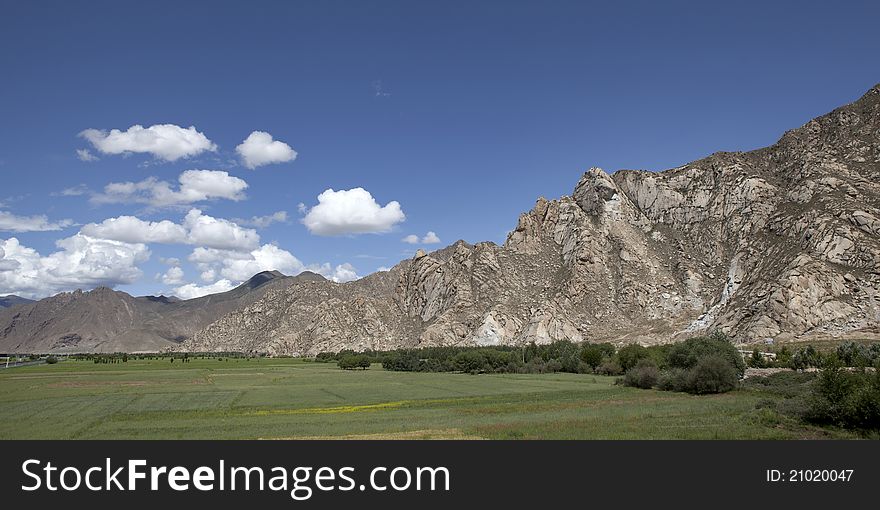 Riverside of Lhasa River and cloudy sky