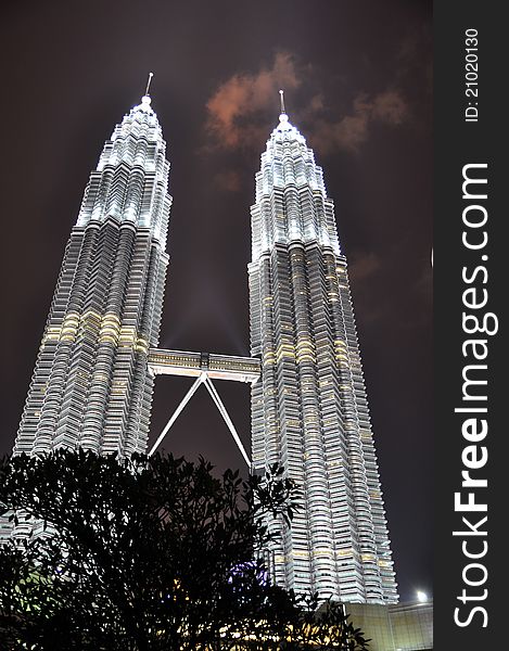 Famous Architecture building in asia - KLCC Twin Tower mysterious night scene. Famous Architecture building in asia - KLCC Twin Tower mysterious night scene.