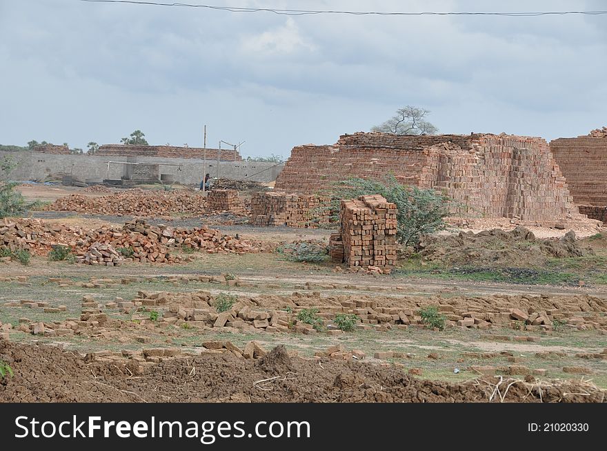 Brick factory in rural India - stacks of bricks