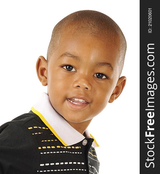 Closeup portrait of a handsome African American preschooler on a white background. Closeup portrait of a handsome African American preschooler on a white background.