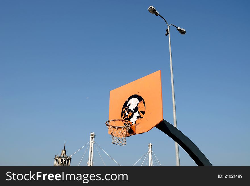 Orange basketball backboard and sky