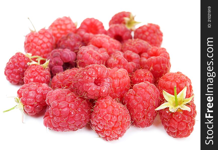 Fresh summer raspberries on a white background