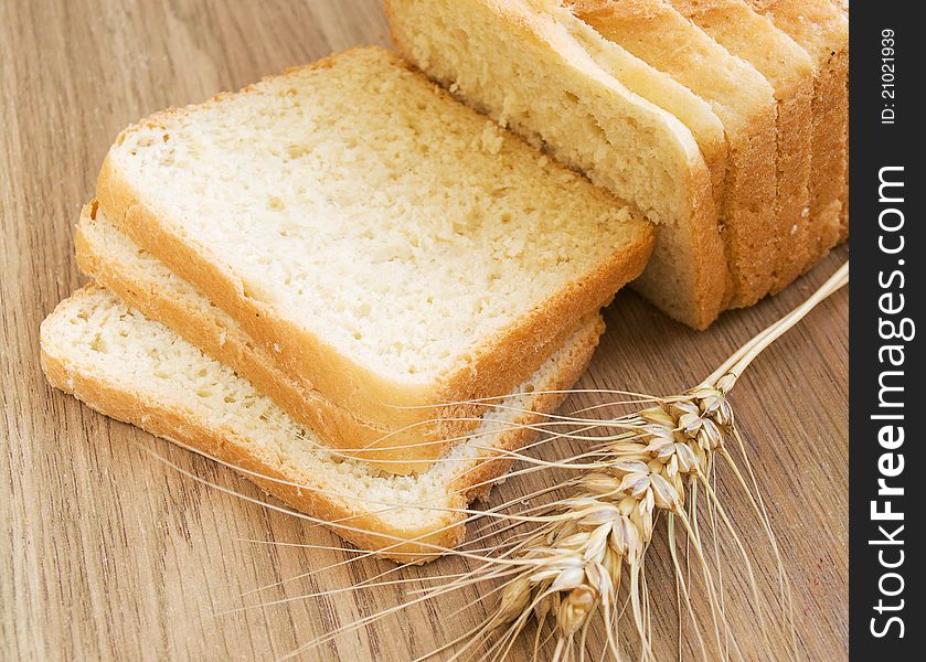 White bread and wheat on the table