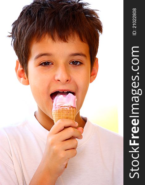 A boy enjoying his ice-cream closeup portrait shot