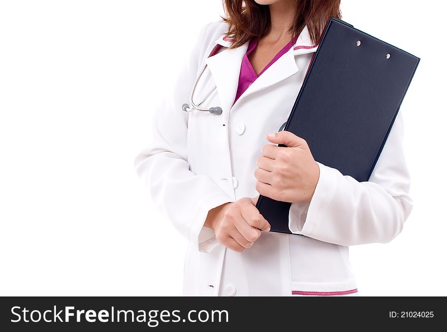 Side view close up of a young doctor woman holding a clipboard- isolated