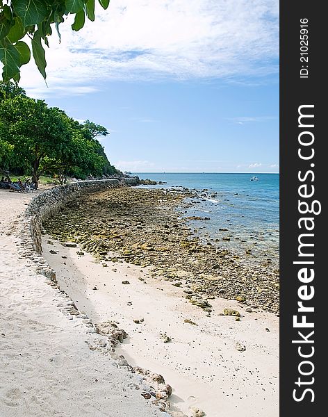 Sand beach on rocky coast line the Koh Larn of Thailand