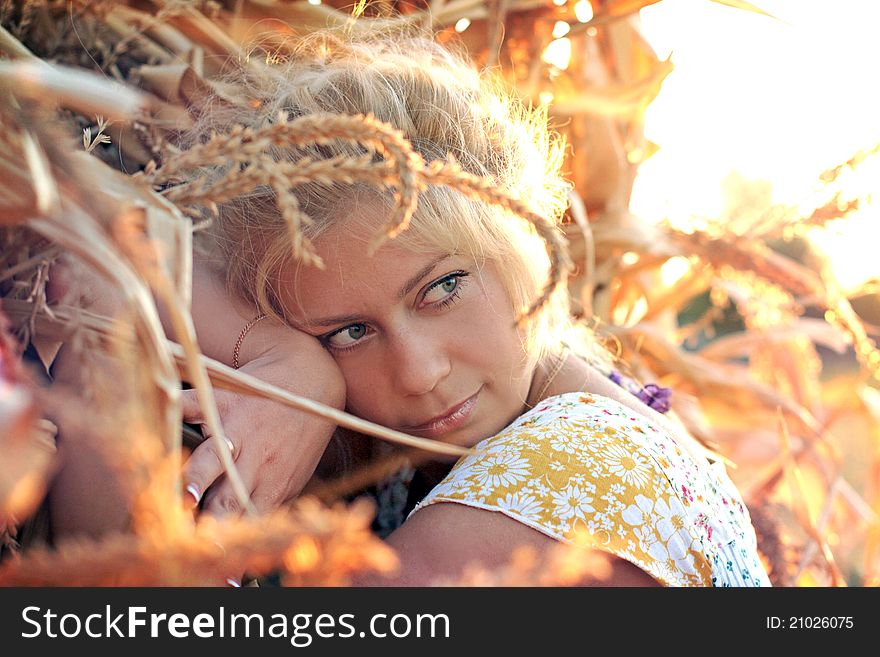 Young Woman In Corn Haystack