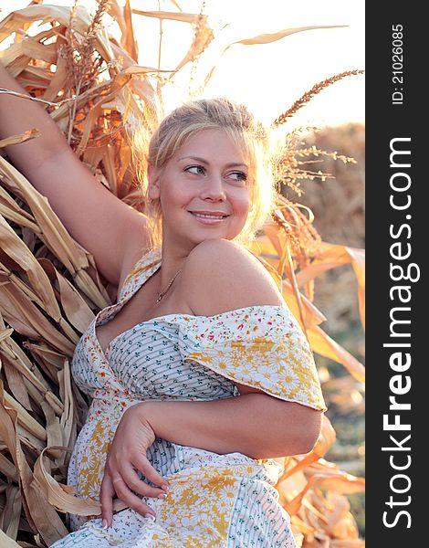 Young Woman In Corn Haystack