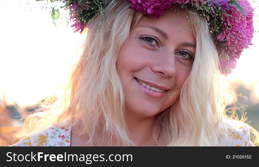 Young woman in corn field