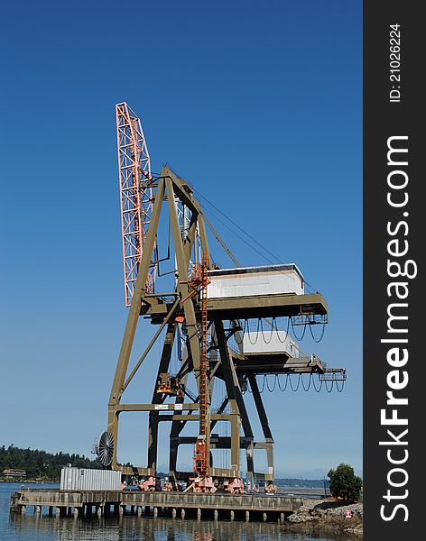 Two cranes at a Washington port. Two cranes at a Washington port