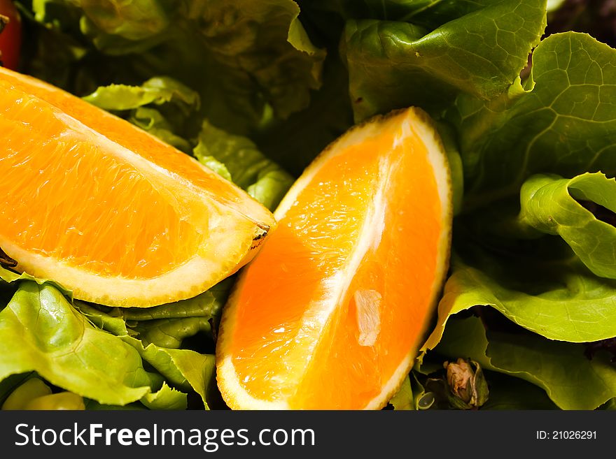 Composition of fruits and vegetables lettuce and orange