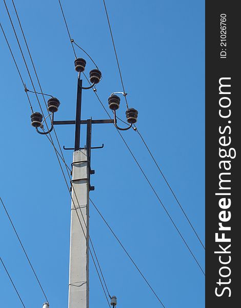 Electric pole with wires on a sky background. Electric pole with wires on a sky background