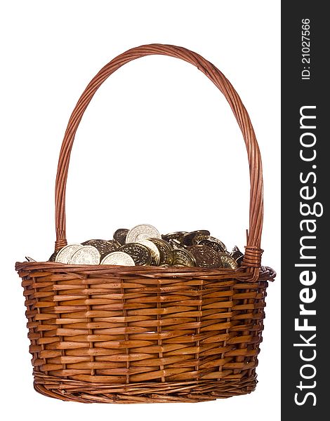Pile of golden coins in a wooden basket isolated on a white background. Pile of golden coins in a wooden basket isolated on a white background.