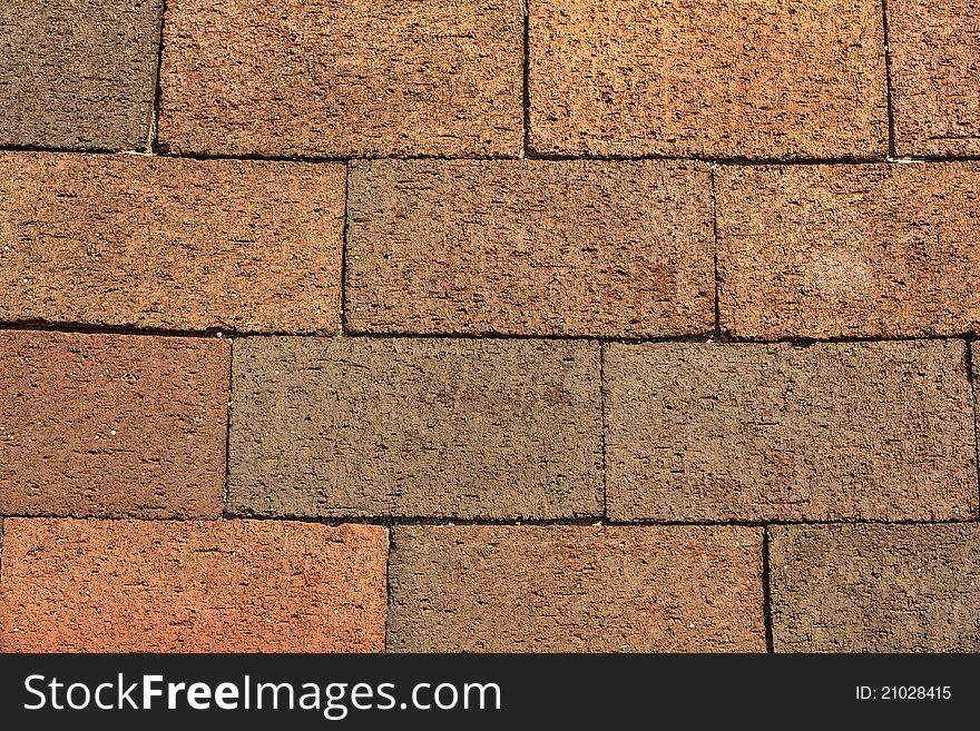 Close-up shot of the texture of a brick Wall.