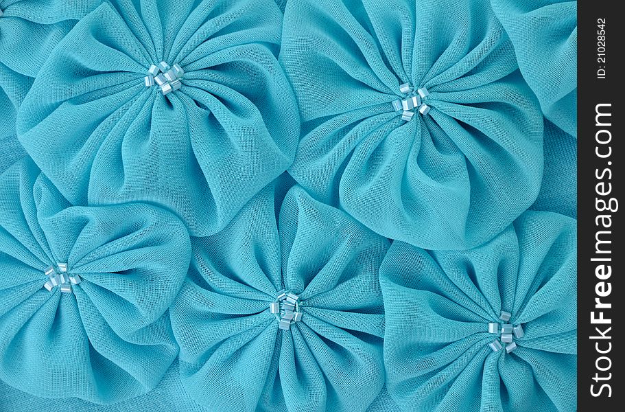 Blue fabric flowers , close up for background