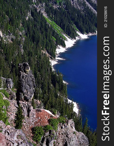 A stone sentry guarding the shore of Crater Lake. A stone sentry guarding the shore of Crater Lake