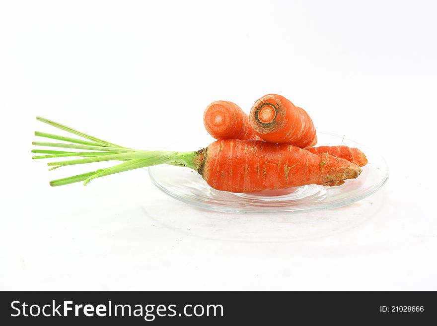 Fresh Carrot on glass dish