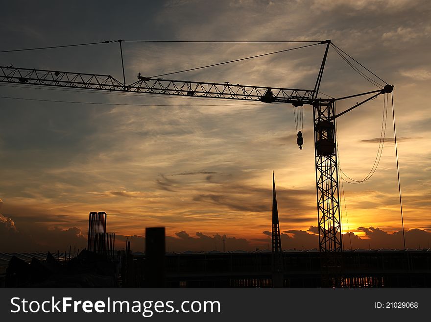 Construction crane with sunset in thailand