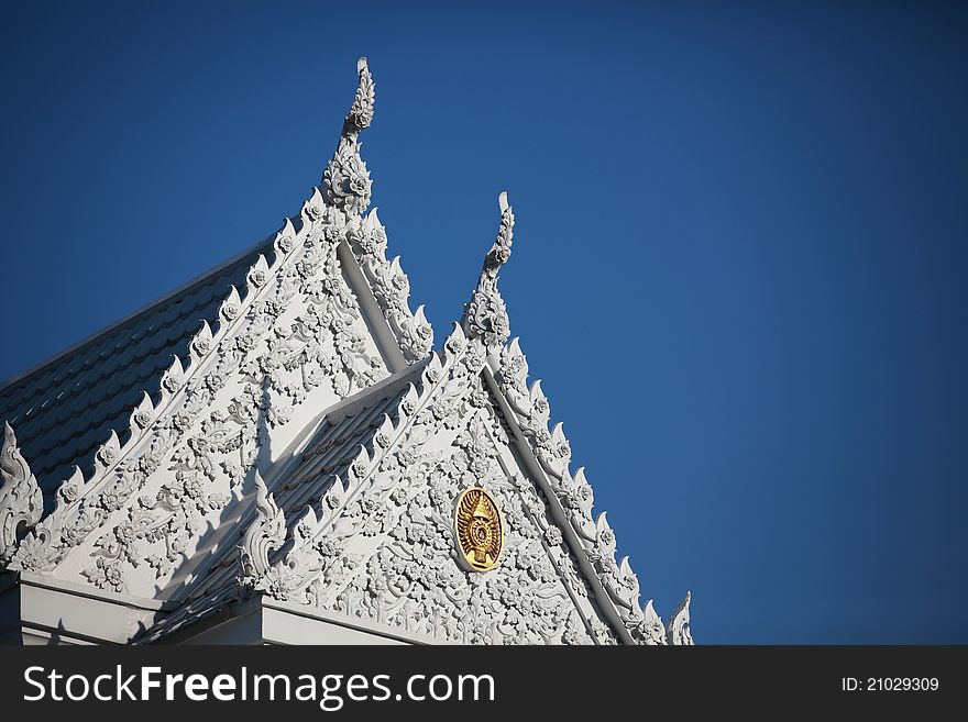 Buddhist temple with blue sky in thailand