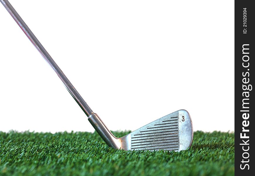 Golfing equipment on artficial grass outdoors