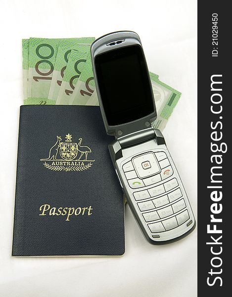 Australian passport, cash and mobile phone representing travel money. Australian passport, cash and mobile phone representing travel money