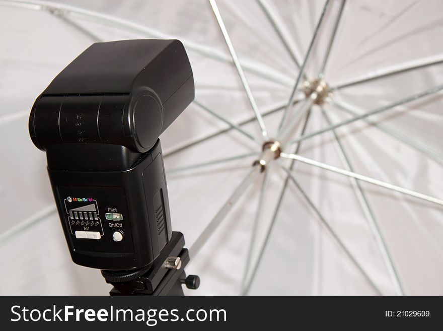 Black studio flash with white octagonal soft box