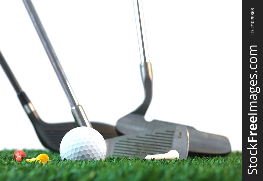 Golfing equipment on artficial grass outdoors