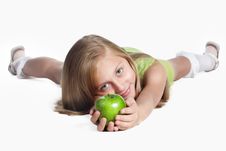 Little Girl With An Apple Stock Photography